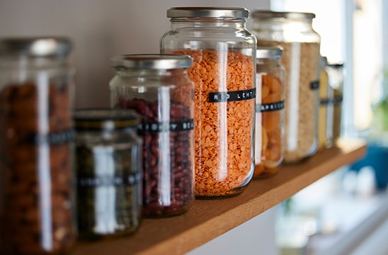 Photo of jars of dry goods on a shelf