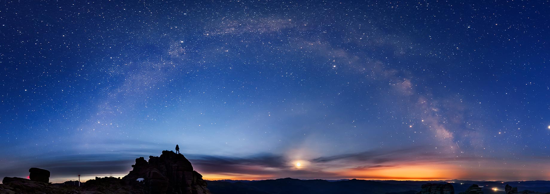 panorama of sunset and milky way