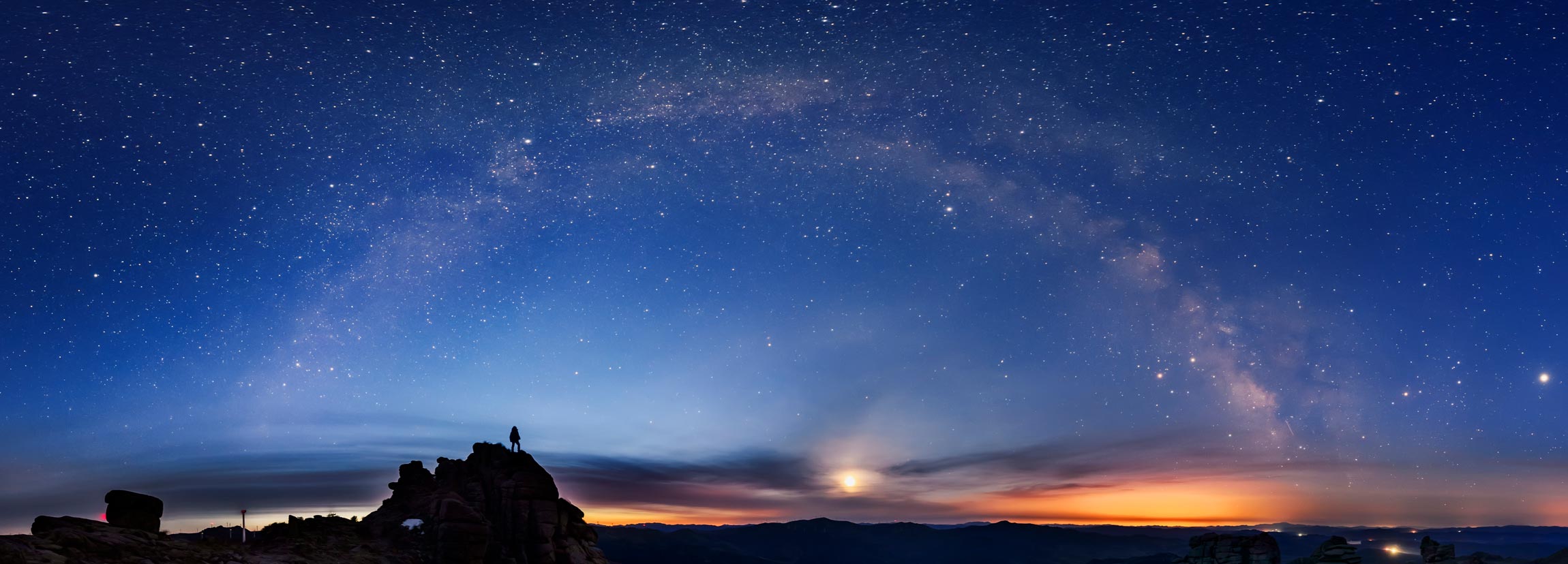 Panorama of sunset and milky way