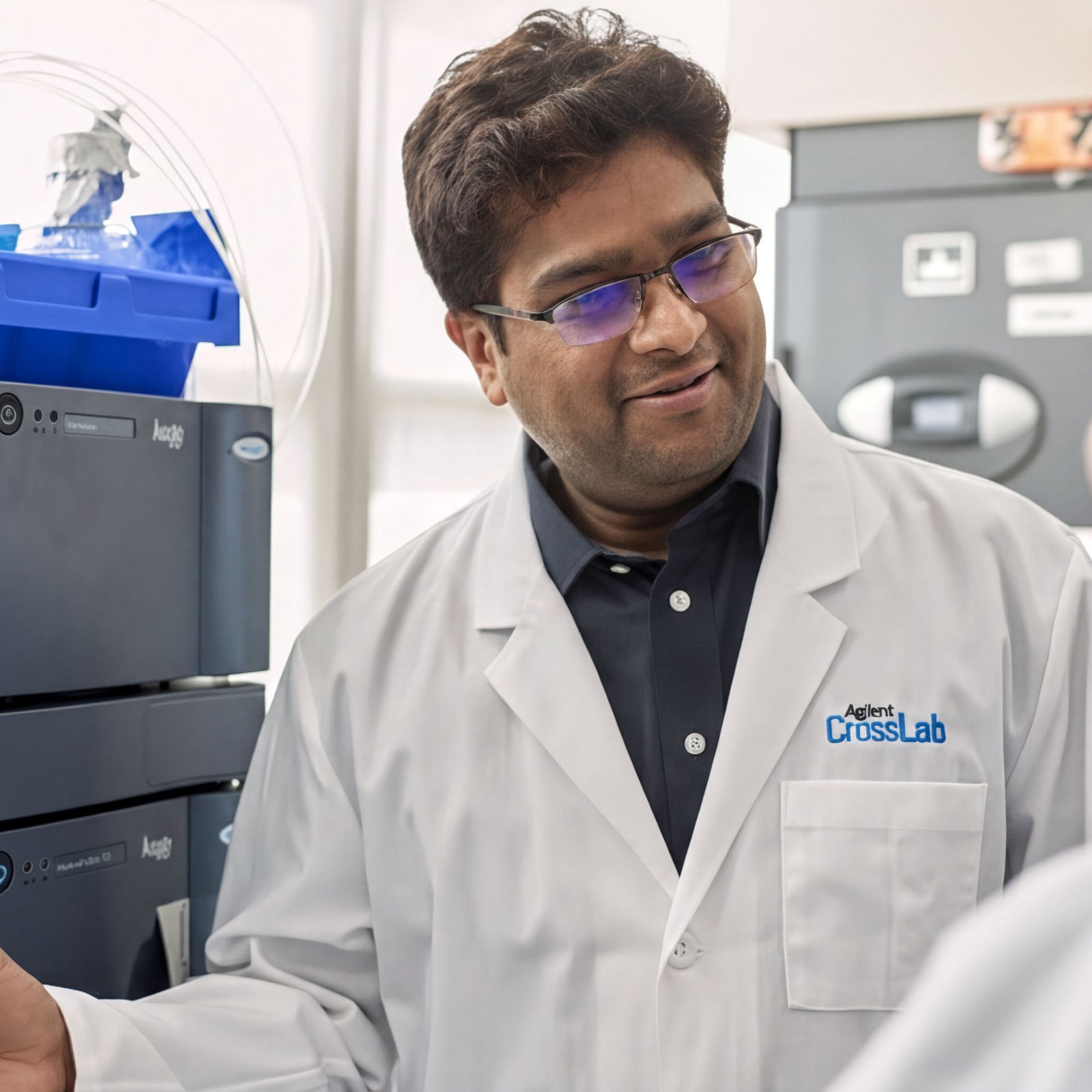 CrossLab scientist demonstrating equipment