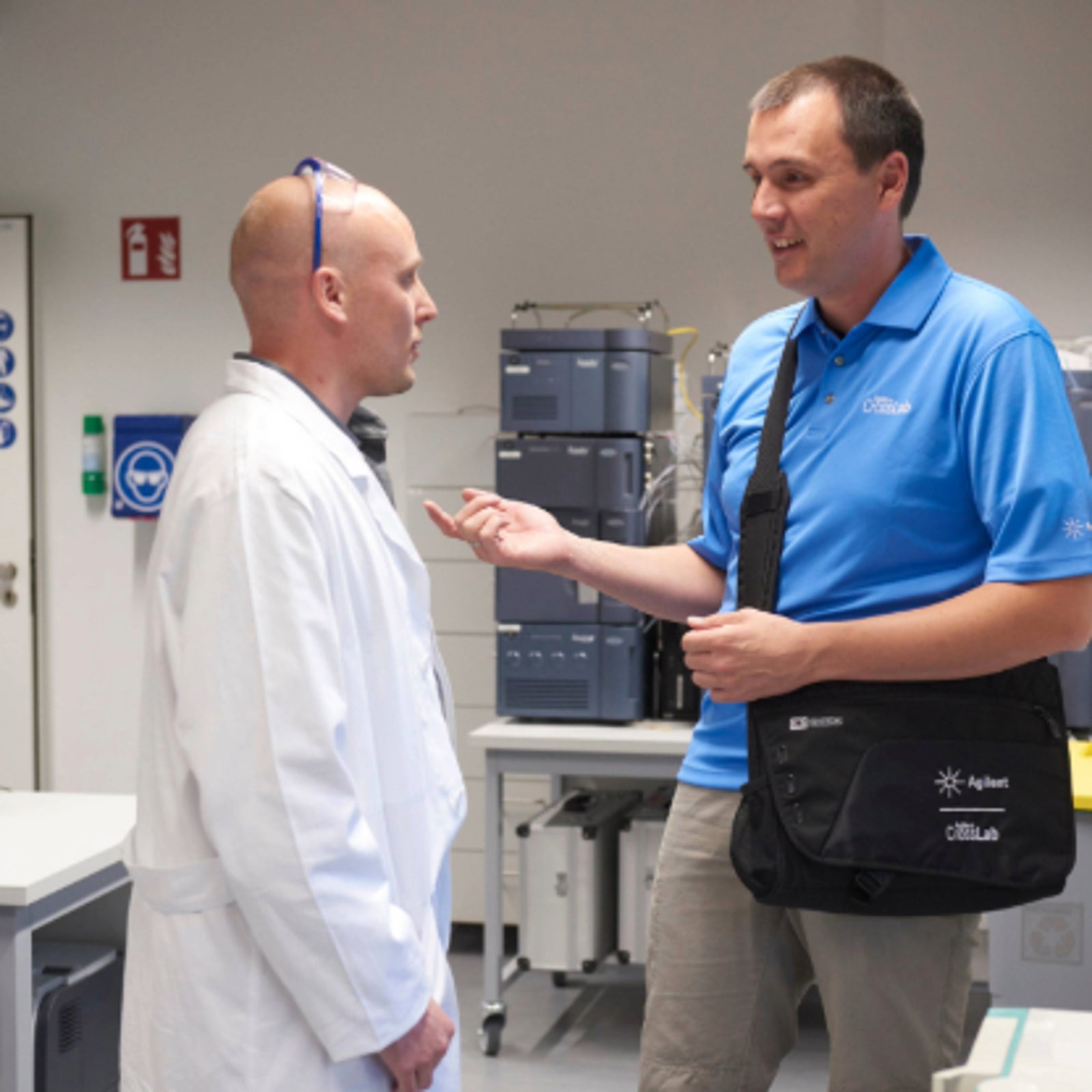A CrossLab rep talking with a customer