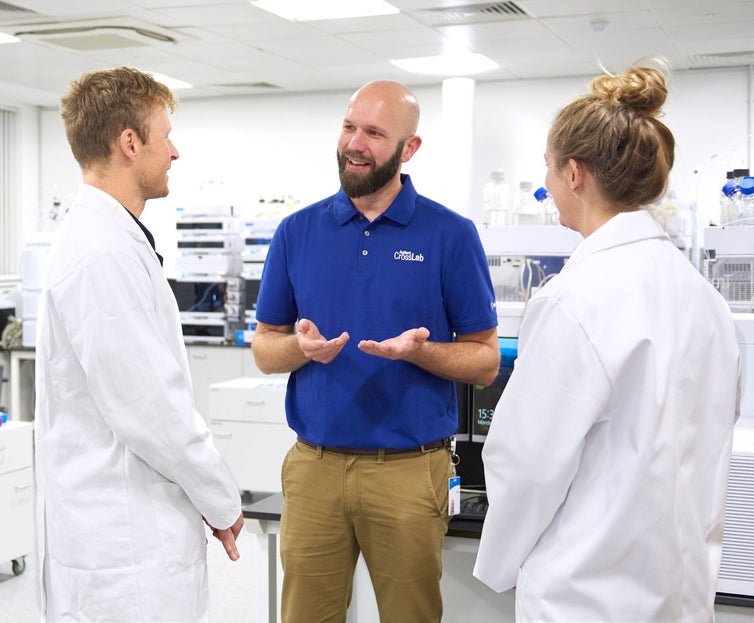Lab personnel talking